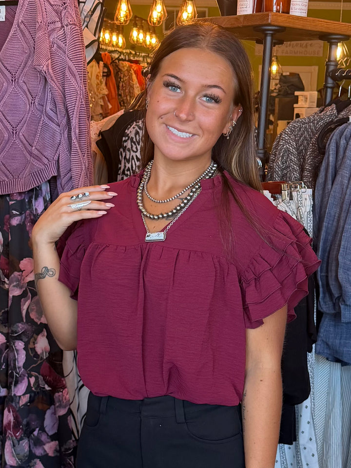 AIRFLOW OVERSIZED RUFFLE SLEEVE BLOUSE - BURGUNDY