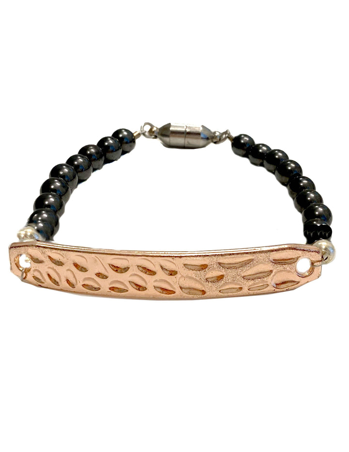 Hammered copper bar and black magnetic beaded bracelet